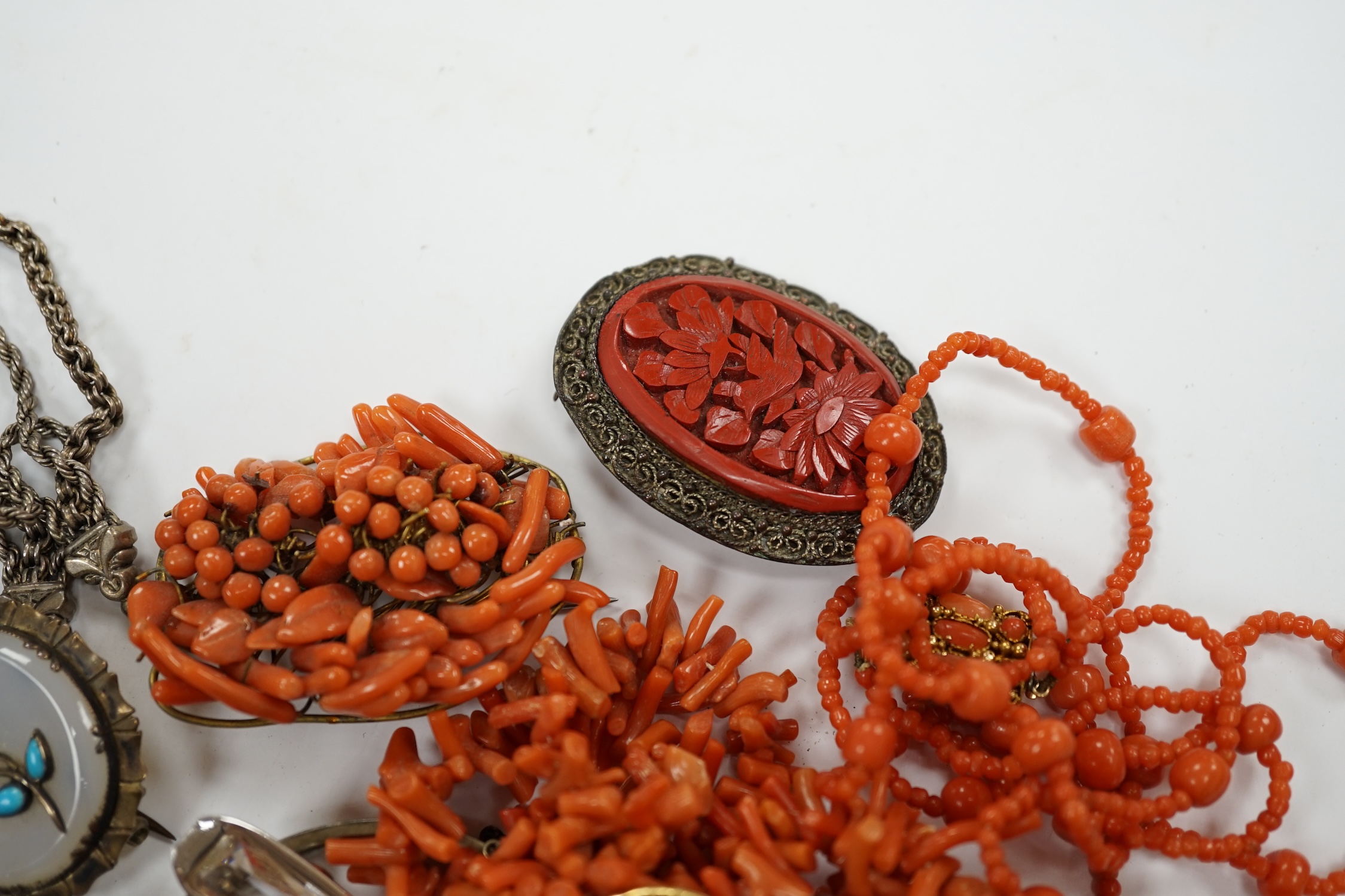 A group of assorted jewellery including costume, coral necklaces, chalcedony and turquoise set brooch, sterling bangle etc. Condition - poor to fair